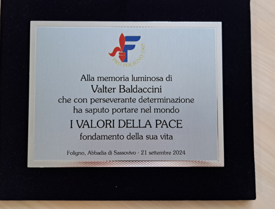 A plaque of honor for Valter Baldaccini, a man of peace